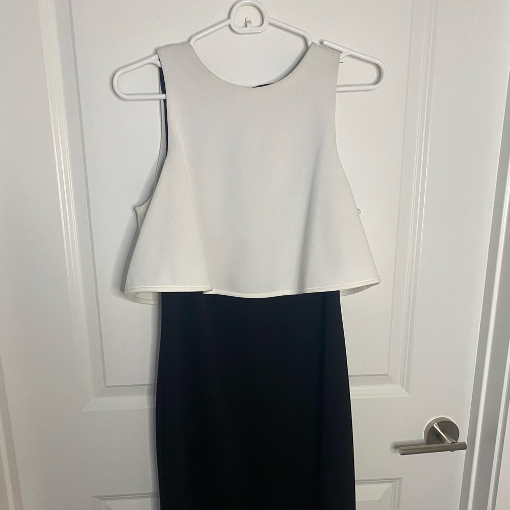 Black and white Calvin Klein semi-open back dress.